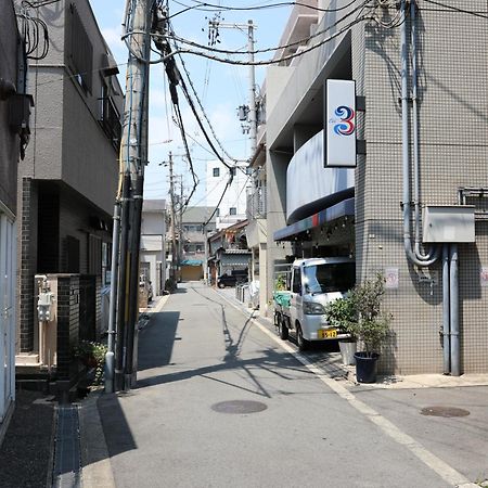 Guesthouse Yours Osaka Bagian luar foto